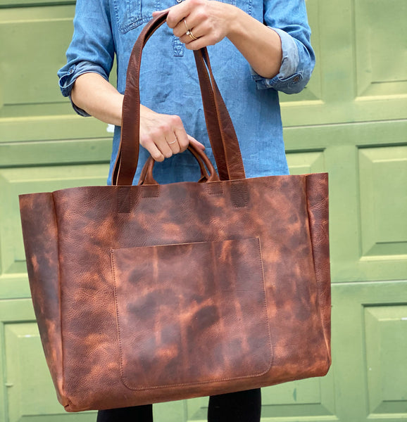 Oversized brown leather tote with double handles