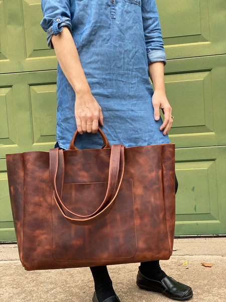 Oversized brown leather tote with double handles