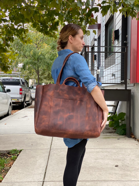 Oversized brown leather tote with double handles