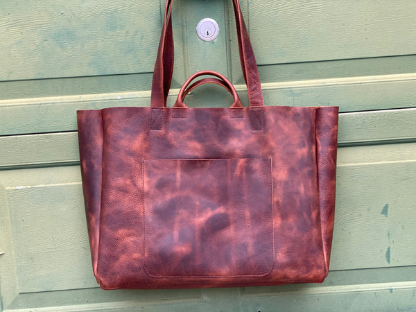 Oversized brown leather tote with double handles