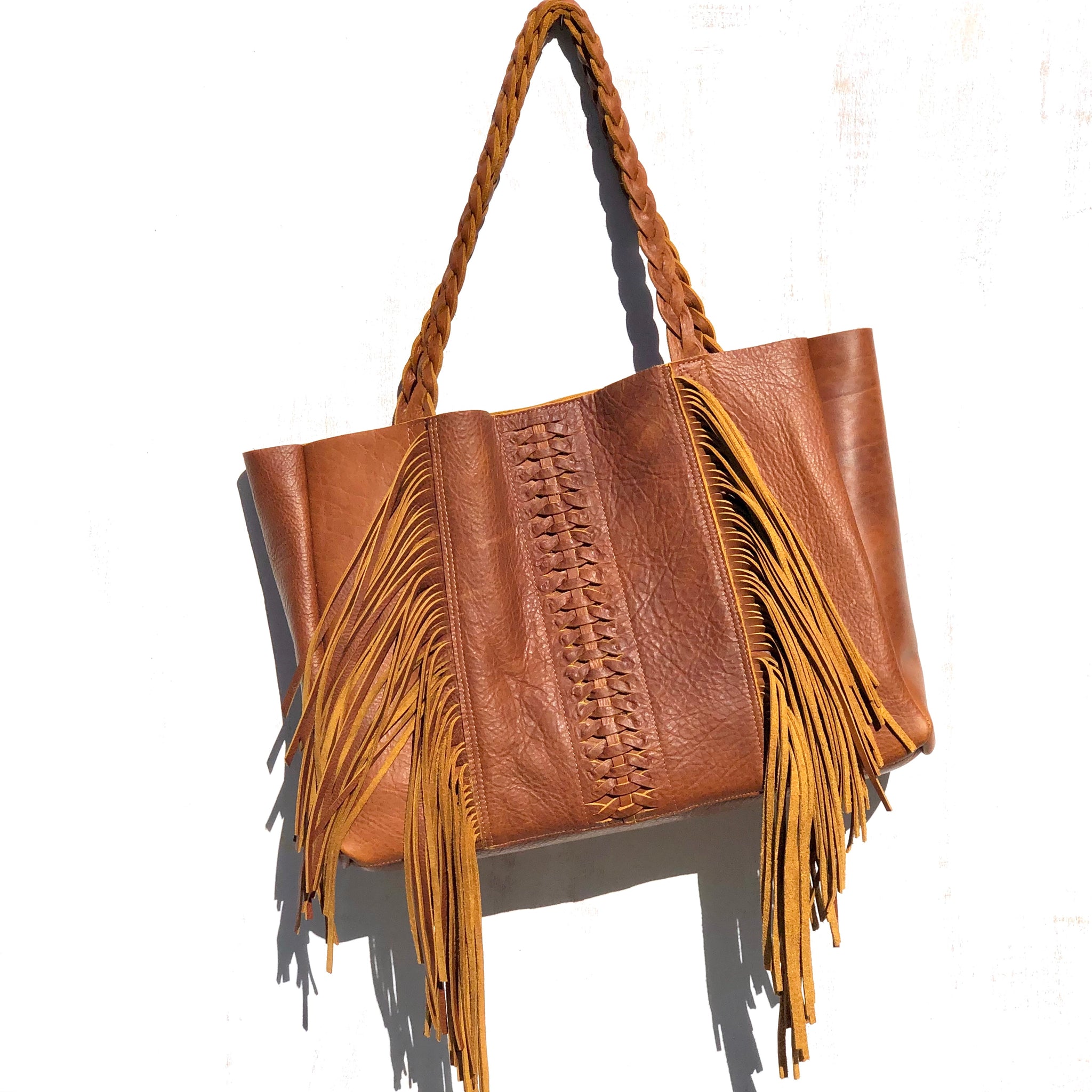Cognac, boho chic braided leather bag