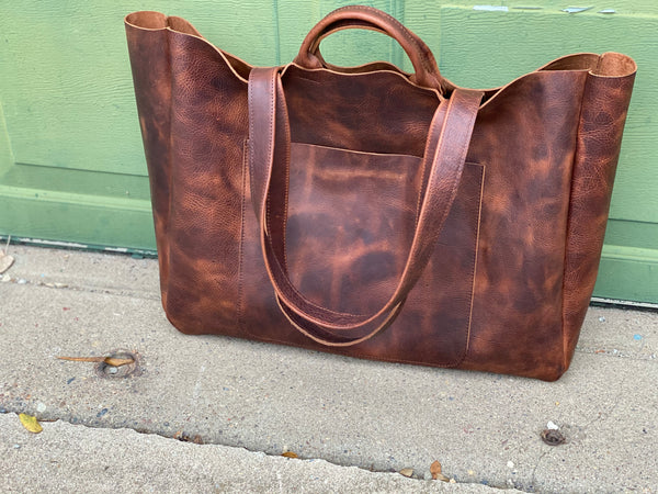 Oversized brown leather tote with double handles