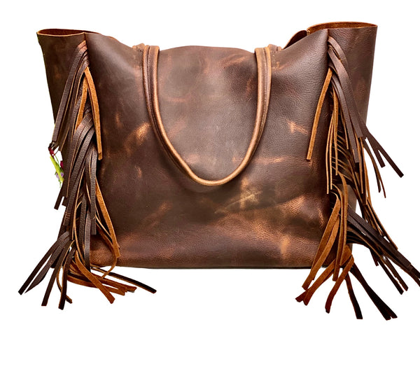 Vintage brown leather tote with side fringe