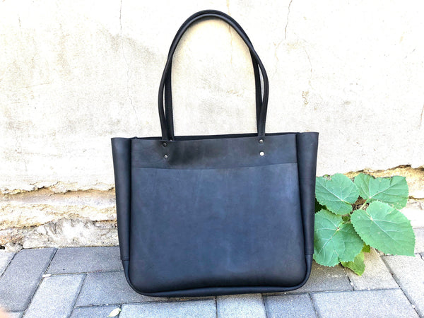 Large leather tote bag with front pocket