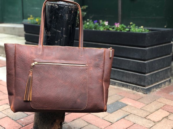 Large leather tote with front pocket